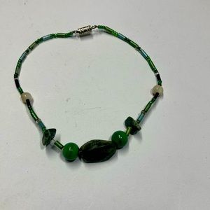 Handmade beaded bracelet in green. Original design